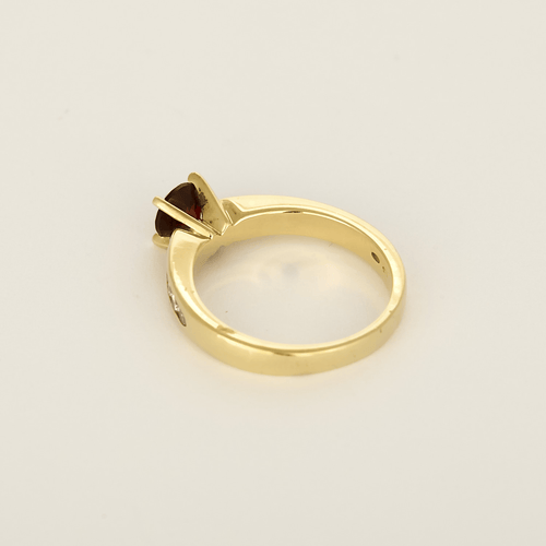 Bague 50 Bague en Or jaune 14k Grenat et Diamants 58 Facettes DV34766-1