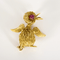 Broche Broche Poussin en or jaune et rubis 58 Facettes DV35975-2