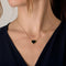 Collier Collier en or jaune et pendentif coeur avec une plaque d'onyx 58 Facettes DV23308-10