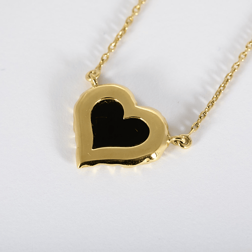Collier Collier en or jaune et pendentif coeur avec une plaque d'onyx 58 Facettes DV23308-10
