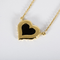Collier Collier en or jaune et pendentif coeur avec une plaque d'onyx 58 Facettes DV23308-10