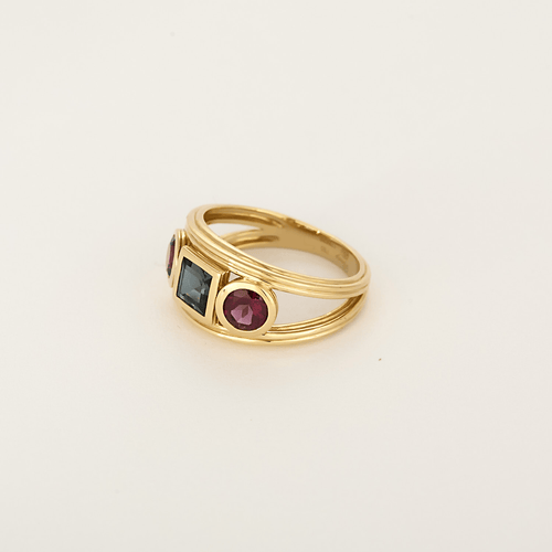 Bague 54 Piaget - Lolita - Bague en or jaune, rhodolite : 0,60 carat et Topaze Blue London : 0,74 carat 58 Facettes DV23308-14