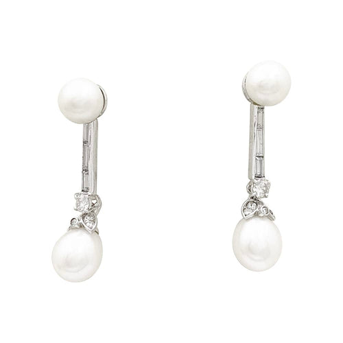 Boucles d'oreilles Boucles d’oreilles pendantes perles et diamants en platine et or blanc 58 Facettes 33846