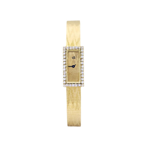 Montre UTI - Montre vintage en or jaune 750/000 et diamants 58 Facettes 34991