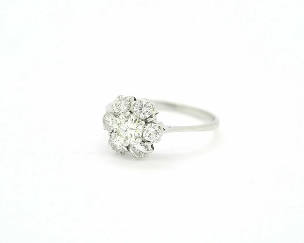 Bague Bague en or blanc 18 ct avec diamant central 0,43 ct et entourage 58 Facettes 10466
