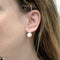 Boucles d'oreilles Pomellato Capri - Boucles d’oreilles en or blanc avec opale et diamants 58 Facettes 35332