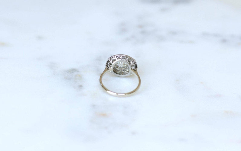 Bague 55 Bague cible ronde Art Déco en or blanc 18kt, platine et diamants 58 Facettes