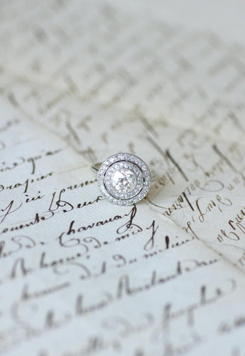 Bague 55 Bague cible ronde Art Déco en or blanc 18kt, platine et diamants 58 Facettes