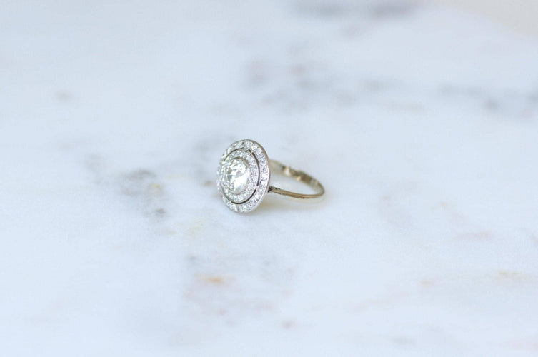 Bague 55 Bague cible ronde Art Déco en or blanc 18kt, platine et diamants 58 Facettes