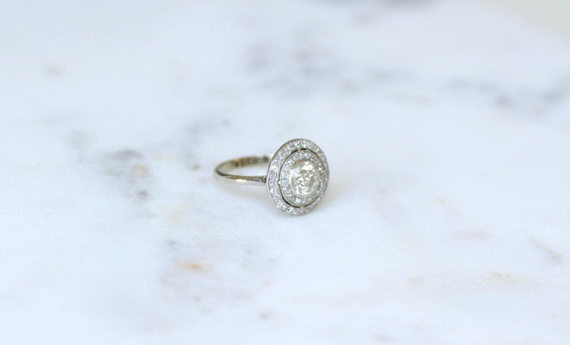 Bague 55 Bague cible ronde Art Déco en or blanc 18kt, platine et diamants 58 Facettes