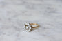 https://cdn.shopify.com/s/files/1/0075/4588/0666/products/bague-de-fiancailles-marguerite-ancienne-or-platine-et-diamants-845625.jpg?v=1645716760