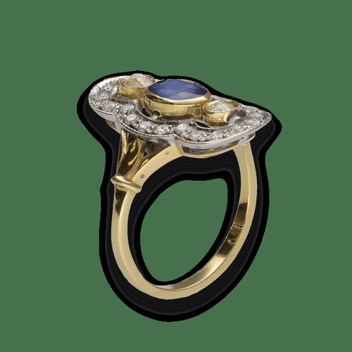 Bague 55 Bague en or jaune et gris 18 Cts avec saphirs et diamants vers 1970. Taille 55. 58 Facettes FB10280