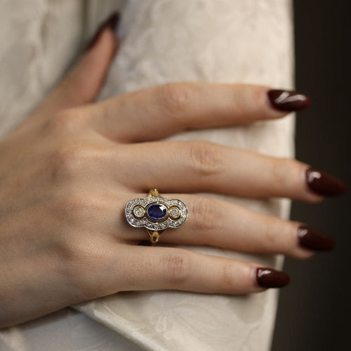 Bague 55 Bague en or jaune et gris 18 Cts avec saphirs et diamants vers 1970. Taille 55. 58 Facettes FB10280