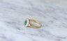 https://cdn.shopify.com/s/files/1/0075/4588/0666/products/bague-marguerite-emeraude-et-diamants-sur-or-725151.jpg?v=1685598211