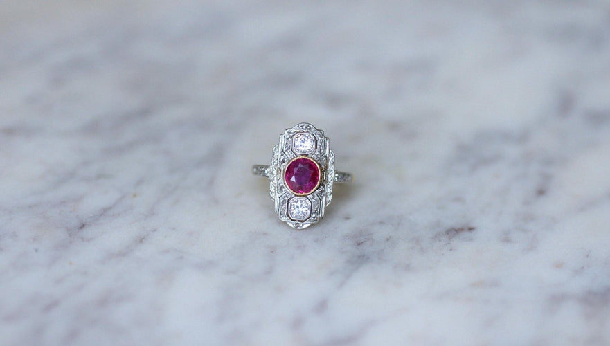 https://cdn.shopify.com/s/files/1/0075/4588/0666/files/bague-marquise-art-deco-rubis-birman-et-diamants-995540.jpg?v=1751376985