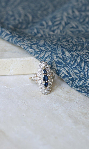 Bague 53 Bague marquise en or jaune et blanc 18kt et saphirs, diamants 58 Facettes