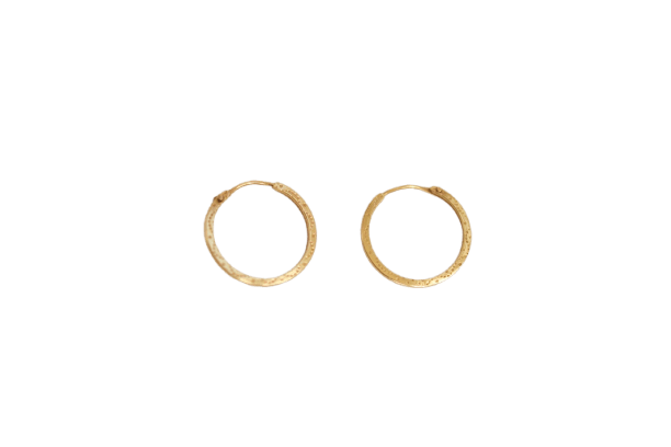 Boucles d'oreilles Boucles d’oreilles créoles gravées en or jaune 18 carats 58 Facettes 3651