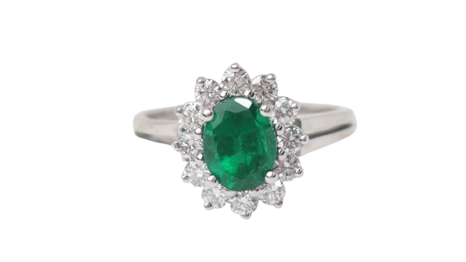 Bague 49 Bague marguerite en or blanc 18 kt, émeraude et diamants 58 Facettes 32907