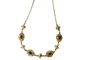Collier Collier draperie en or jaune 18k et saphirs cabochons 58 Facettes