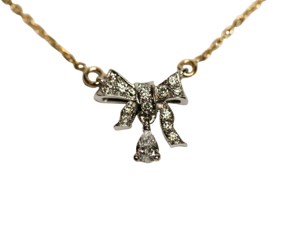 Pendentif Pendentif nœud style art déco pavé de diamants en or blanc et jaune 58 Facettes F1969