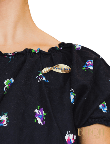 Broche Van Cleef & Arpels - Broche feuille en or jaune et saphirs, diamants 58 Facettes A9417