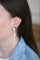 Boucles d'oreilles Boucles d'oreilles pendantes corail peau d'ange en or blanc et saphirs, diamants 58 Facettes