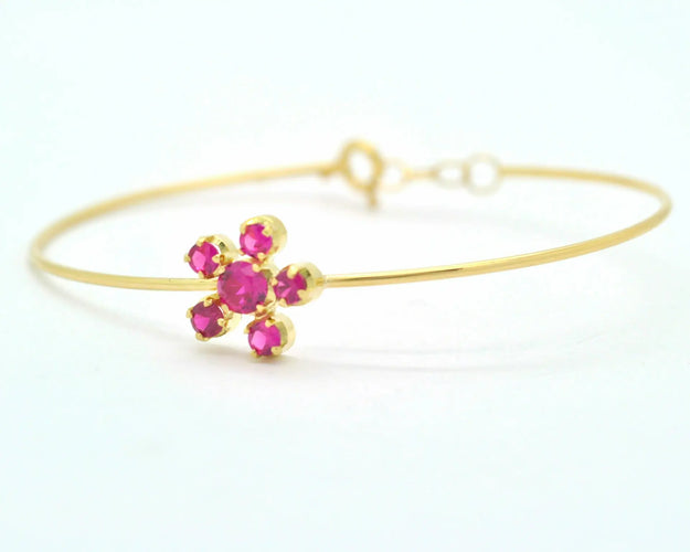 Bracelet Bracelet rigide en or jaune 18 ct avec rubis synthétiques 58 Facettes 8426