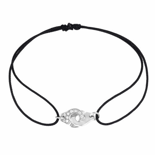 Bracelet Dinh Van Menottes - Bracelet cordon en or blanc et diamants 58 Facettes 62000238