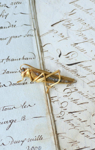 Broche Broche sauterelle ancienne en or jaune 18kt et diamants 58 Facettes