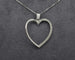 Collier Collier - Pendentif cœur en or blanc 18 ct et diamants 0,38 ct 58 Facettes 10433