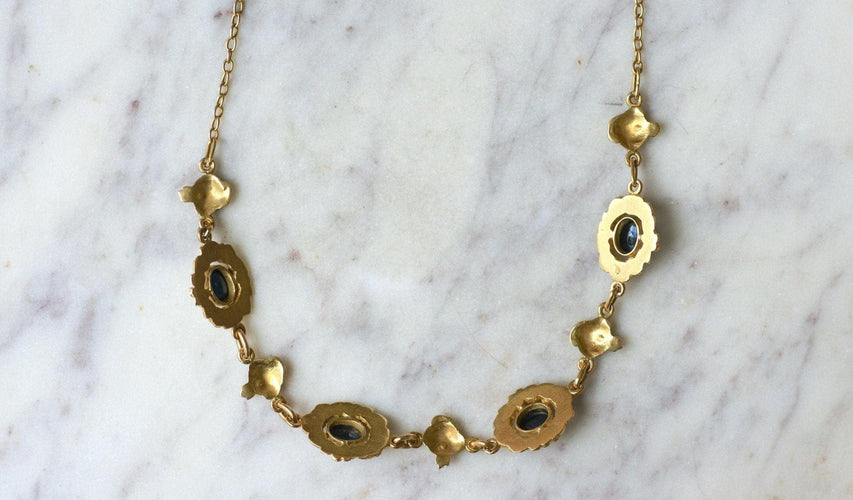 Collier Collier draperie en or jaune 18k et saphirs cabochons 58 Facettes