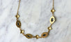Collier Collier draperie en or jaune 18k et saphirs cabochons 58 Facettes