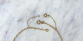 Collier Collier draperie en or jaune 18k et saphirs cabochons 58 Facettes