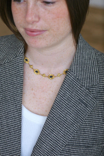 Collier Collier draperie en or jaune 18k et saphirs cabochons 58 Facettes