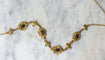 Collier Collier draperie en or jaune 18k et saphirs cabochons 58 Facettes