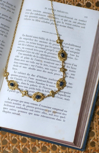 Collier Collier draperie en or jaune 18k et saphirs cabochons 58 Facettes
