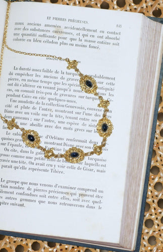 Collier Collier draperie en or jaune 18k et saphirs cabochons 58 Facettes