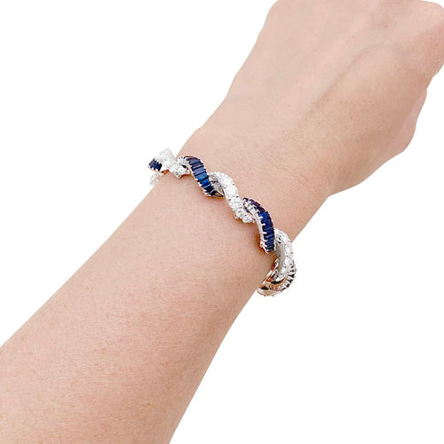 Bracelet Bracelet articulé en or blanc 750 serti de diamants et saphirs 58 Facettes 33891
