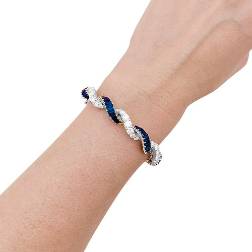 Bracelet Bracelet articulé en or blanc 750 serti de diamants et saphirs 58 Facettes 33891