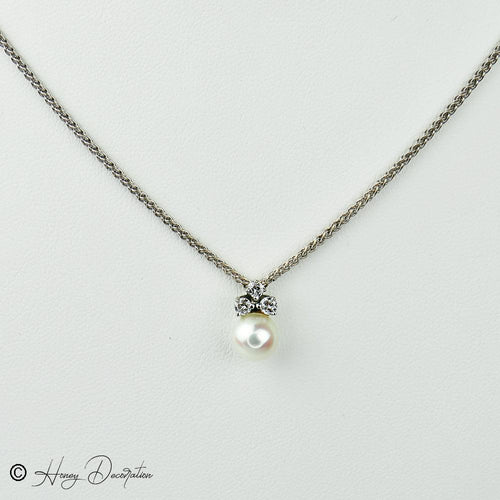 Collier Chaîne en or blanc 18 carats avec pendentif perle et diamants 58 Facettes 2251