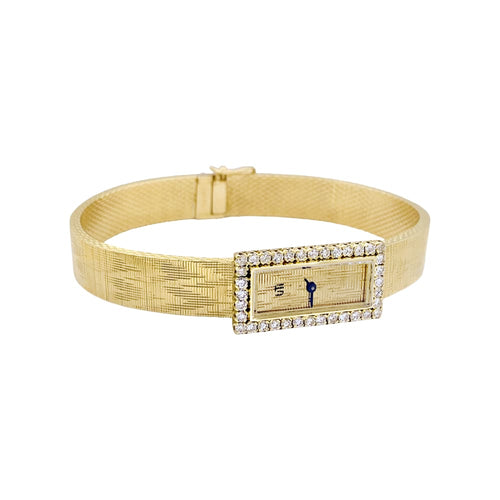 Montre UTI - Montre vintage en or jaune 750/000 et diamants 58 Facettes 34991