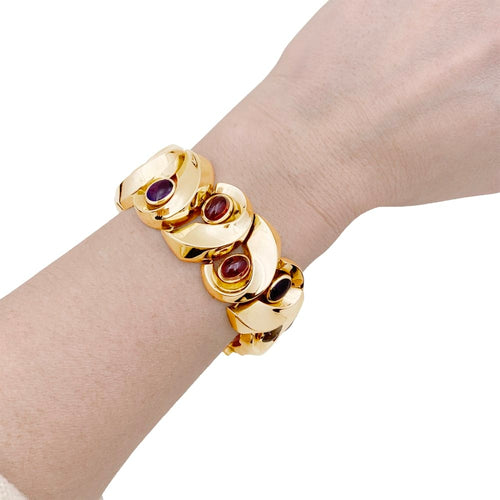 Bracelet Bracelet vintage en or jaune 750 serti d’améthystes, grenats et quartz rutile 58 Facettes 35227