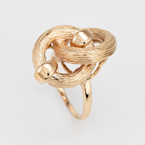 Bague Bague nœud infini vintage années 1970 en or jaune 14k, corail et rubis 58 Facettes G12466