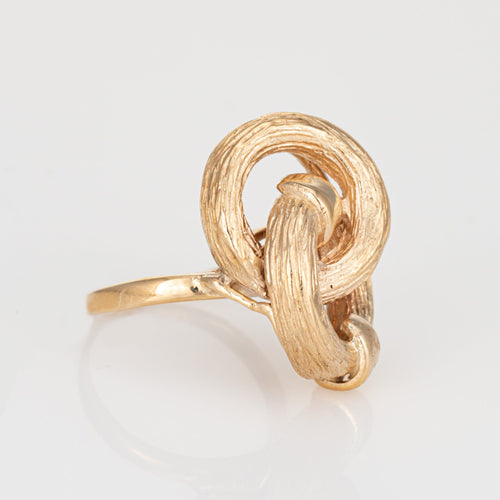 Bague Bague nœud infini vintage années 1970 en or jaune 14k, corail et rubis 58 Facettes G12466