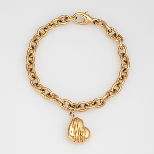 Bracelet Tiffany & Co - Bracelet à breloques Cupid Arrow en or jaune 18k 58 Facettes G13931