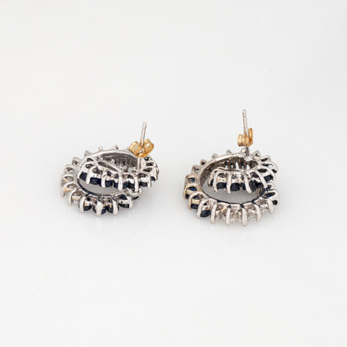 Boucles d'oreilles Boucles d'oreilles tourbillon diamants et saphirs en or blanc 14k 58 Facettes G14073
