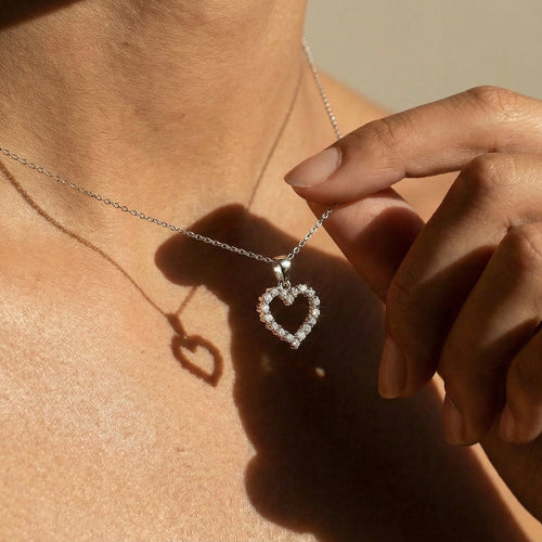 Pendentif Pendentif cœur en or blanc 14 carats et diamants env. 0,50 ct 58 Facettes