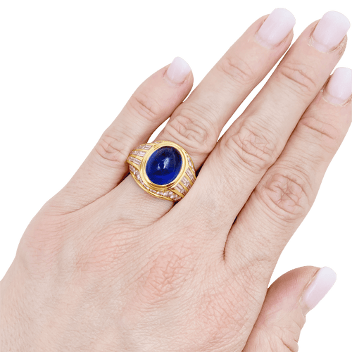 Bague 52 Bague dôme en or jaune 750 sertie d’un saphir cabochon 12,32 ct 58 Facettes 34494