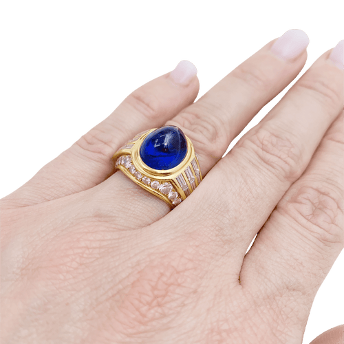 Bague 52 Bague dôme en or jaune 750 sertie d’un saphir cabochon 12,32 ct 58 Facettes 34494