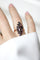 Bague 55 Bague marquise en or rose 18kt et grenats sur paillon 58 Facettes